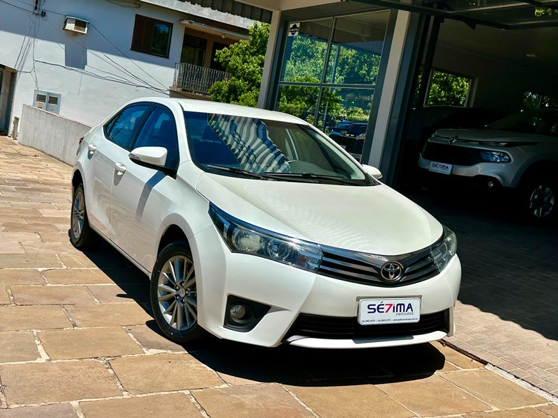 TOYOTA COROLLA XEI 2.0 2016/2017 SÉTIMA VEÍCULOS GUAPORÉ / Carros no Vale