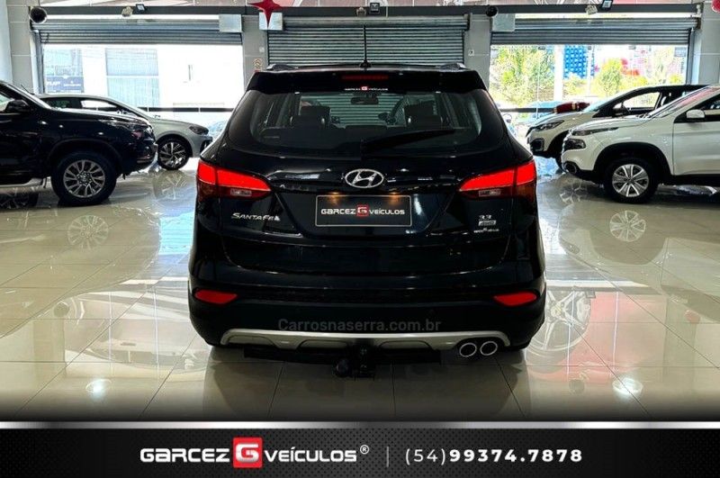 HYUNDAI SANTA FÉ 3.3 MPFI 4X4 7 LUGARES V6 270CV 2013/2014 GARCEZ VEÍCULOS BENTO GONÇALVES / Carros no Vale