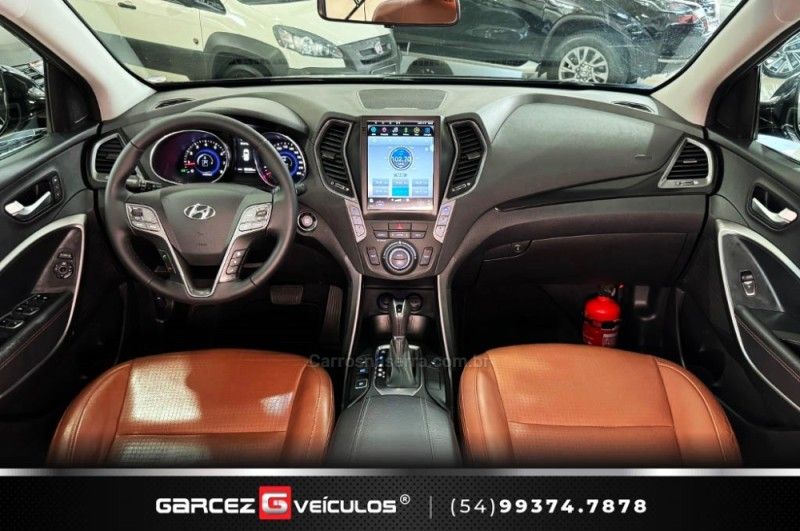 HYUNDAI SANTA FÉ 3.3 MPFI 4X4 7 LUGARES V6 270CV 2013/2014 GARCEZ VEÍCULOS BENTO GONÇALVES / Carros no Vale