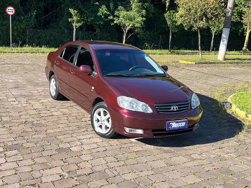 TOYOTA COROLLA 1.8 XEI 16V GASOLINA 4P AUTOMÁTICO 2004/2004 BOSCO AUTOMÓVEIS GUAPORÉ / Carros no Vale